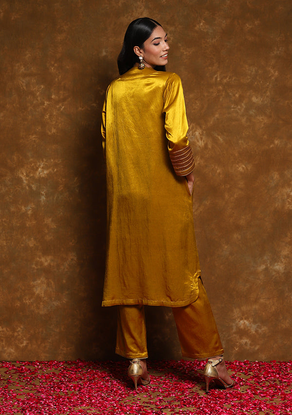 Golden olive silk pants with dori embroidered bootas at hem. – Kora India